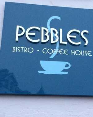 Sign for Pebbles cafe in Seaton